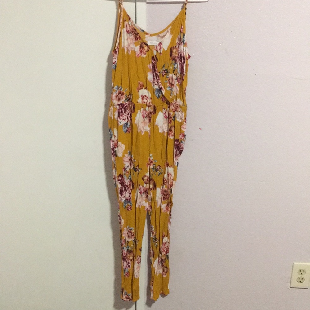 A yellow flowery jumpsuit
